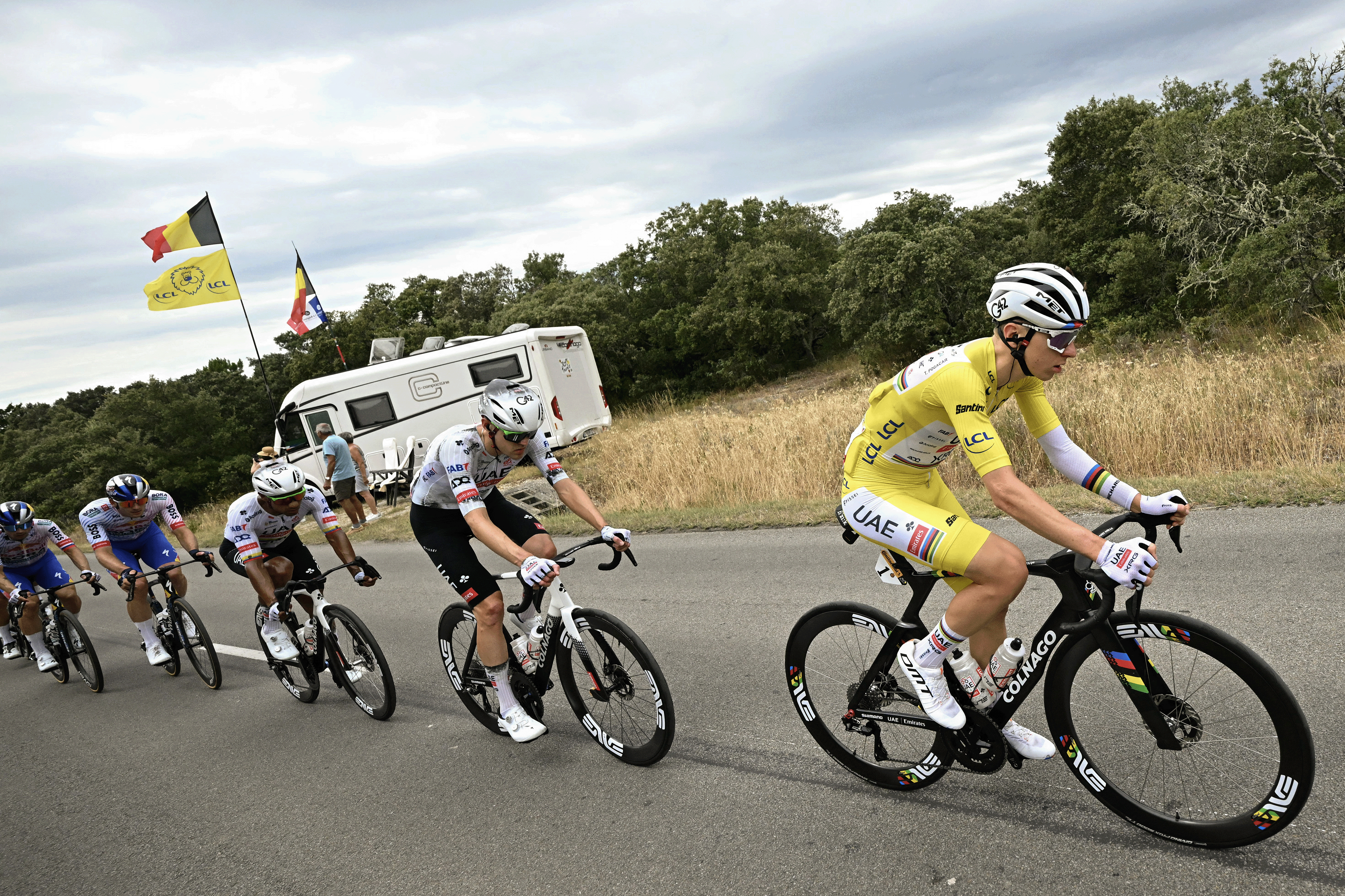UAE Team Emirates - XRG team's Slovenian rider Tadej Pogacar cycles with the pack of riders (peloton) during the 17th stage of the 112th edition of the Tour de France cycling race, 160.4 km between Bollene and Valence, southern France, on July 23, 2025. (Photo by Loic VENANCE / AFP) (Photo by LOIC VENANCE/AFP via Getty Images)