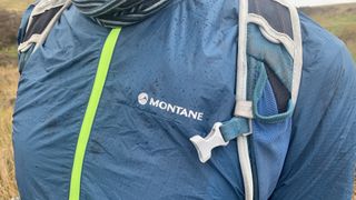 Person wearing Montane Lite-Speed Trail Pull-On waterproof jacket