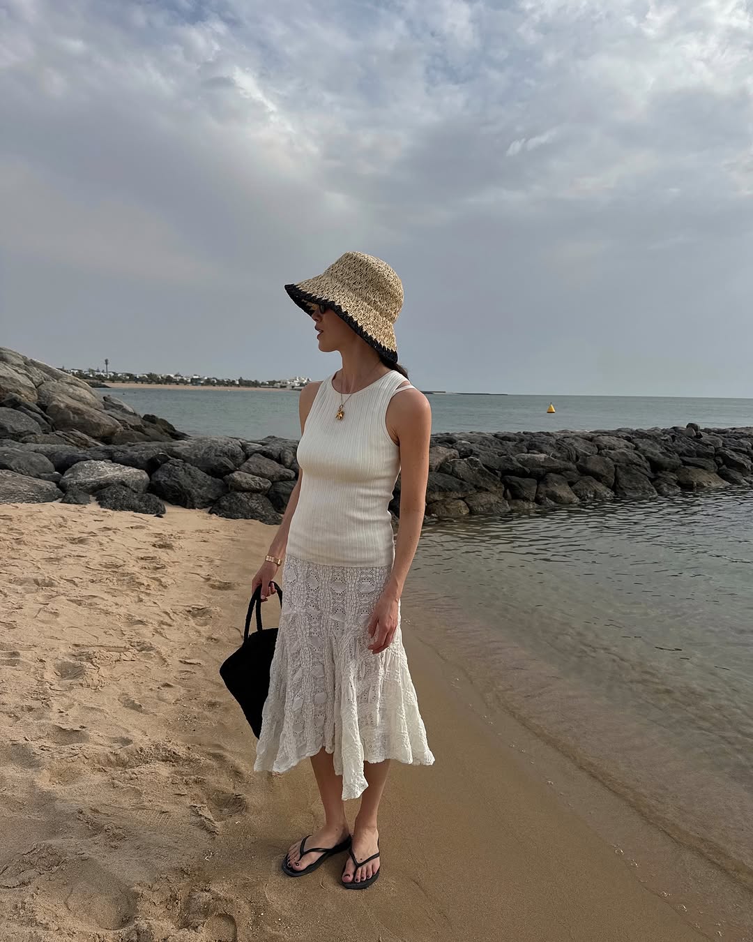 woman wearing white lace midi skirt summer 2025