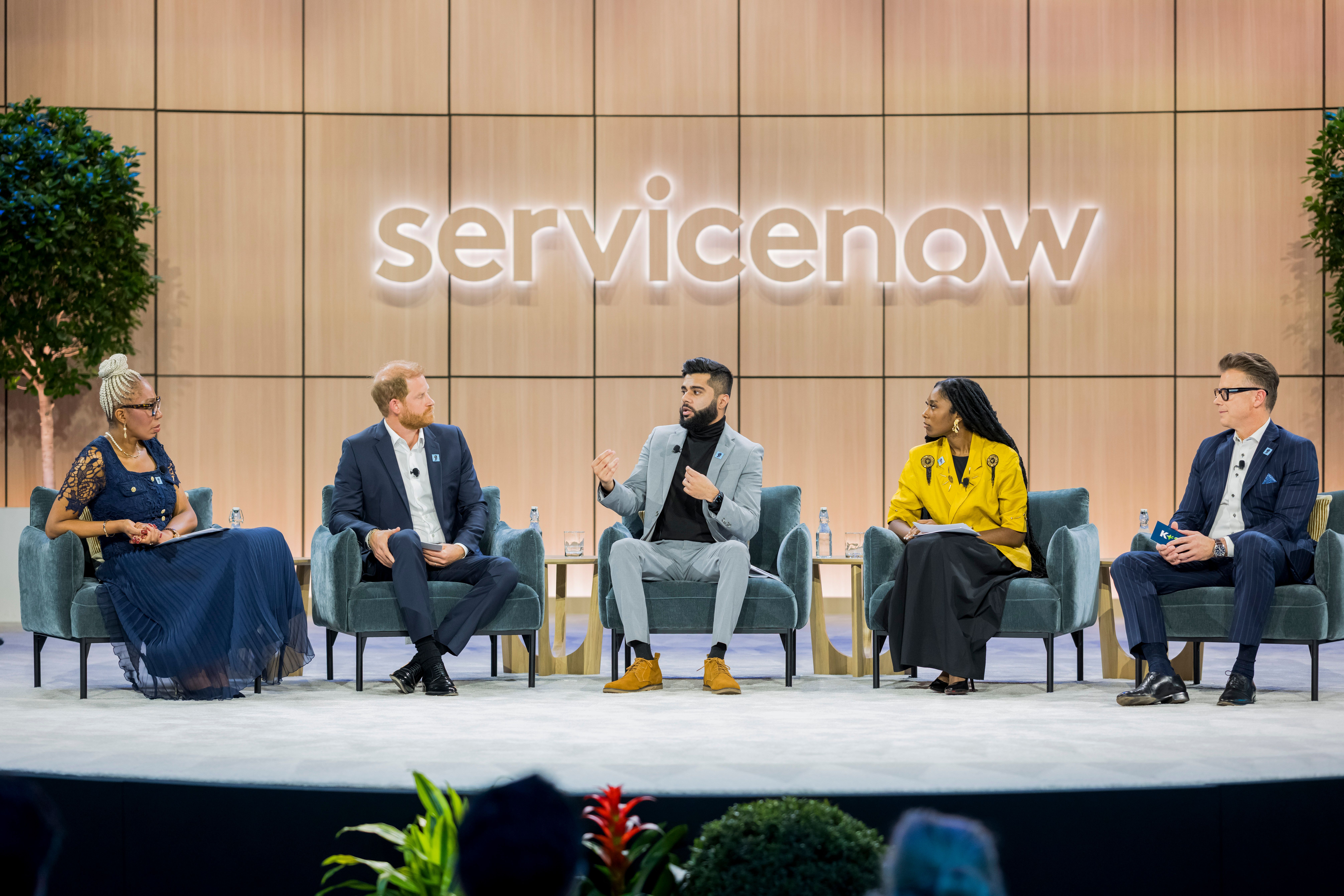 Tessy Ojo, Prince Harry and guests on stage at a Diana Award panel discussion