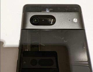 pixel 7 alleged prototype with pixel 7 pro reflection