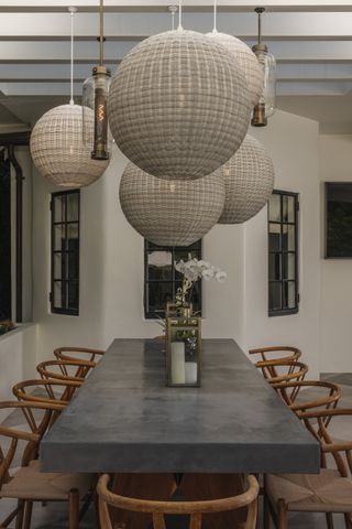 Lanterns over an outdoor dining table