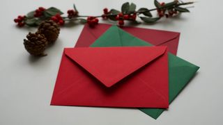 christmas envelopes layered on top of one another