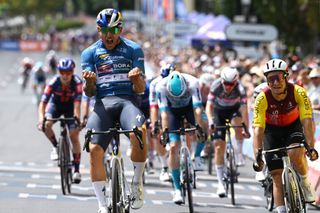 ADELAIDE AUSTRALIA JANUARY 26 LR Sam Welsford of Australia and Team Red Bull BORA hansgrohe Blue Sprint Jersey celebrates at finish line as stage winner ahead of Bryan Coquard of France and Team Cofidis during the 25th Santos Tour Down Under 2025 Stage 6 a 90km stage from Adelaide to Adelaide UCIWT on January 26 2025 in Adelaide Australia Photo by Dario BelingheriGetty Images