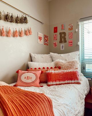 A boho style dorm with accent pillows