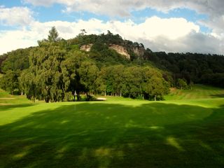 The 11th green, 12th hole and Hawkstone Follies beyond on the Hawkstone Course