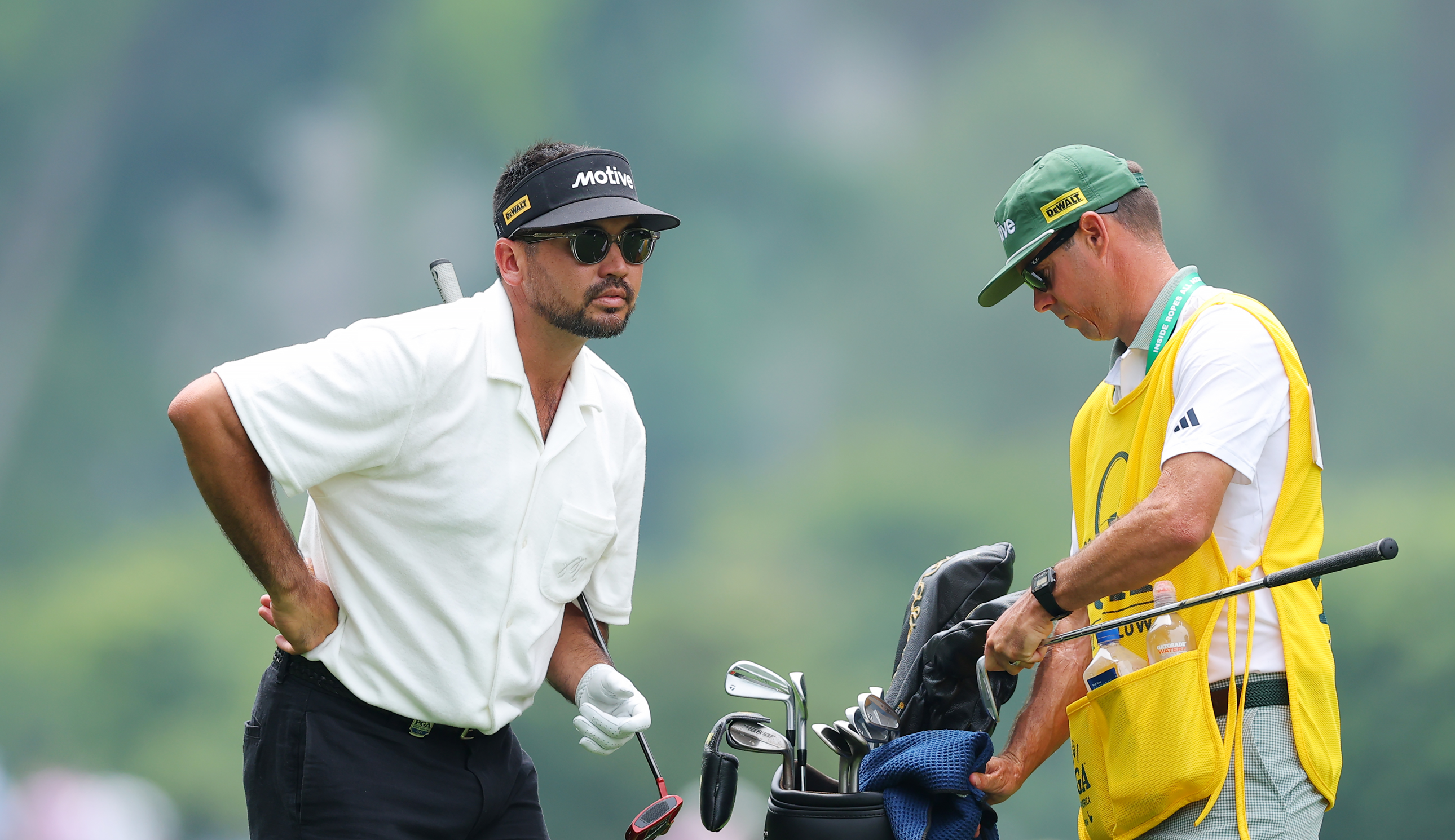 Jason Day chats to his caddie at the PGA Championship