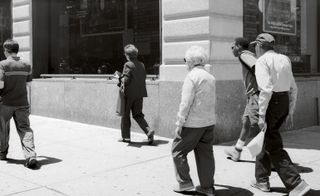 Black and white picture of people walking