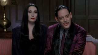 Angelica Huston and Raul Julia in The Addams Family