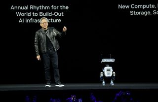 Nvidia's CEO Jensen Huang with a humanoid robot on stage at GTC 2025