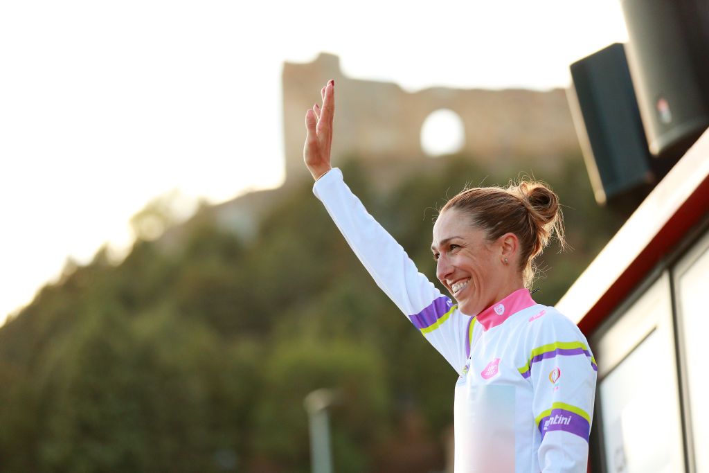 AGUILAR DE CAMPOO SPAIN SEPTEMBER 09 Margarita Victoria Garcia Caellas of Spain and UAE Team ADQ celebrates winning the White Jersey on the podium ceremony after the 8th Ceratizit Challenge By La Vuelta 2022 Stage 3 a 964km stage from Camargo to Aguilar de Campoo CERATIZITChallenge22 UCIWWT on on September 09 2022 in Camargo Spain Photo by Gonzalo Arroyo MorenoGetty Images