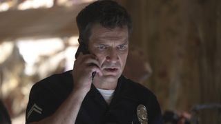 Nathan Fillion as John Nolan on the phone in The Rookie