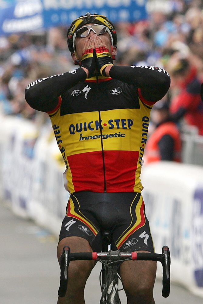Stijn Devolder of Quick Step celebrates as he crosses the finish line of the 92nd Tour of Flanders in 2008.