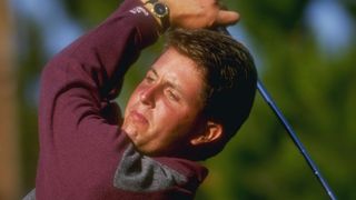 Phil Mickelson takes a shot during an NCAA tournament