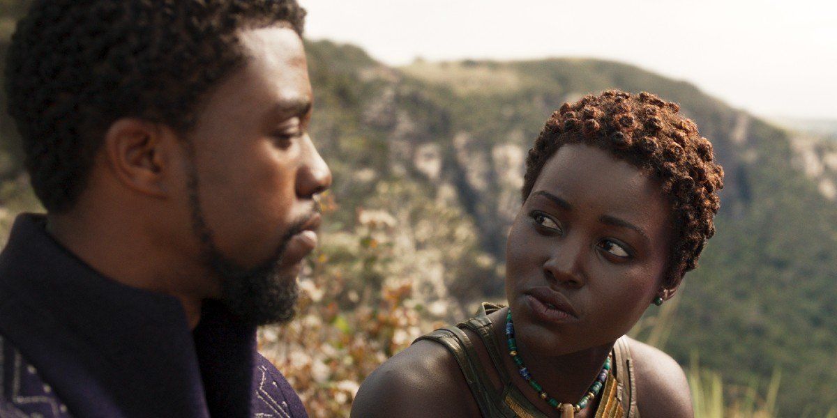 T&#039;Challa (Chadwick Boseman) and Nakia (Lupita Nyong&#039;o) talk in Black Panther (2018)