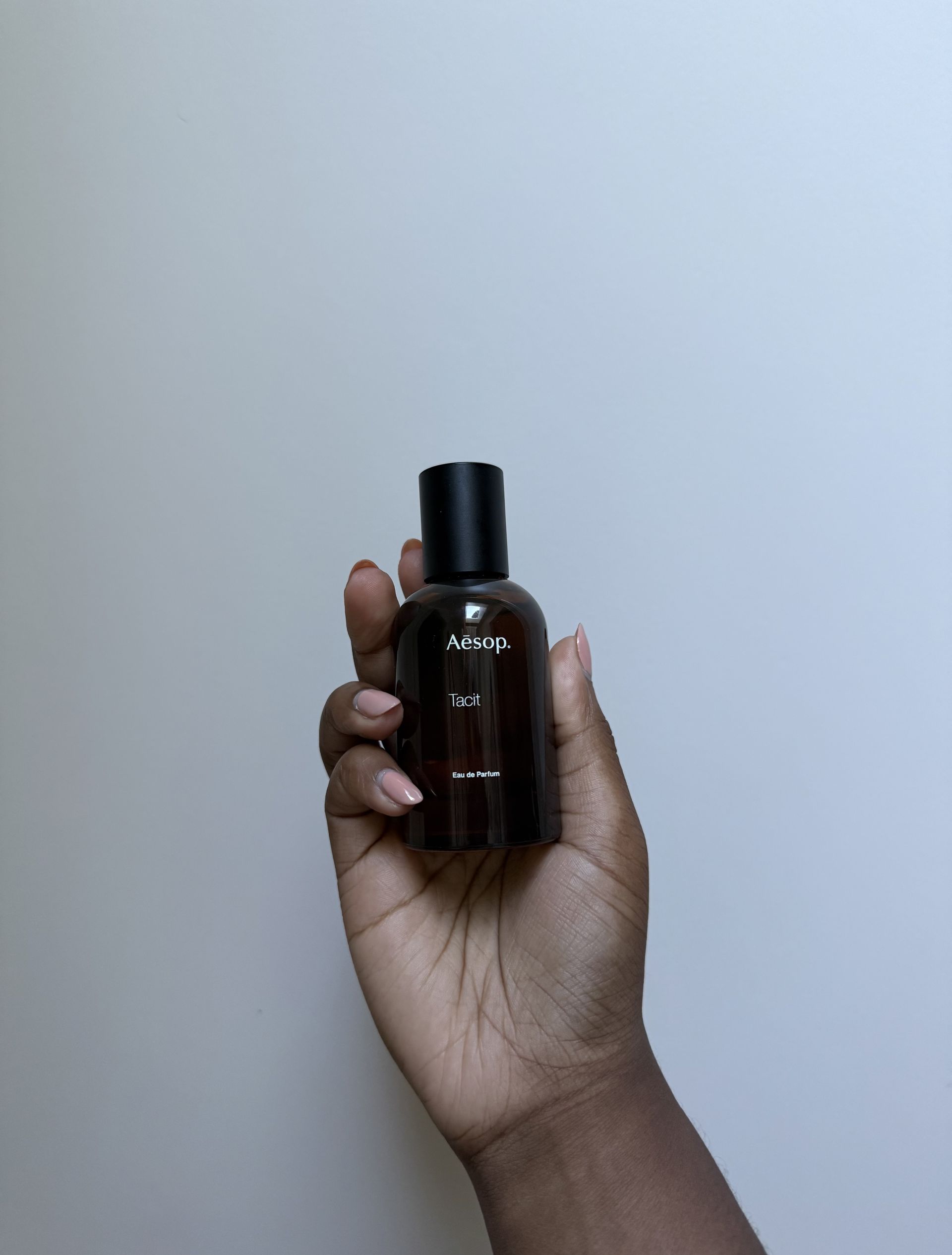 Photo of Maya Thomas testing Aesop's Tacit Eau De Parfum