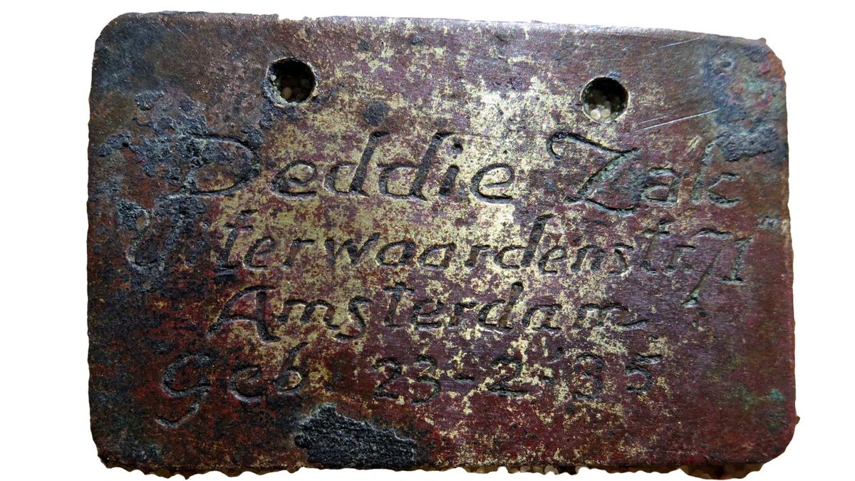 An identity tag belonging to 8-year-old David Jacob (Deddie) Zak, found at Sobibor death camp where he was murdered. 