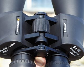 Celestron SkyMaster 8x56 focuses with a center wheel and a single diopter on the right eyepiece. the optics are fully rubber coated and nitrogen purged to prevent fogging problems and water incursion