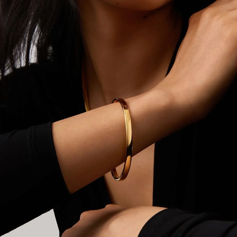 gold-plated bangle by Missoma
