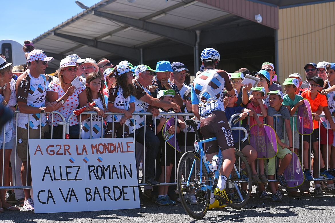 Romain Bardet visits with fans prior to stage 15 of the Tour de France.