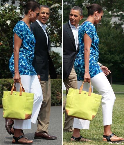 Michelle Obama wearing a blue printed draped dress by Gap