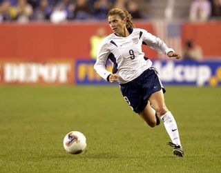 United States forward Mia Hamm breaks upfield October 1, 2003 at Gillette Stadium, Foxboro, Massachuttes, during the quarterfinals of the FIFA Women's World Cup USA 2003. The U. S. defeated Norway 1 - 0. (Photo by A. Messerschmidt/Getty Images)