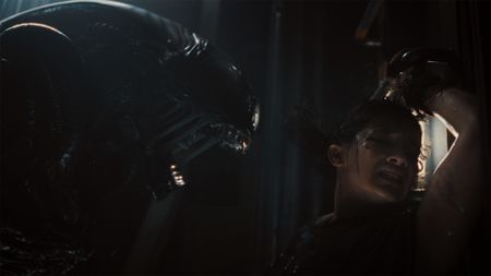 Xenomorph and Cailee Spaeny as Rain Carradine in 20th Century Studios' ALIEN: ROMULUS. Photo courtesy of 20th Century Studios. &copy; 2024 20th Century Studios. All Rights Reserved.