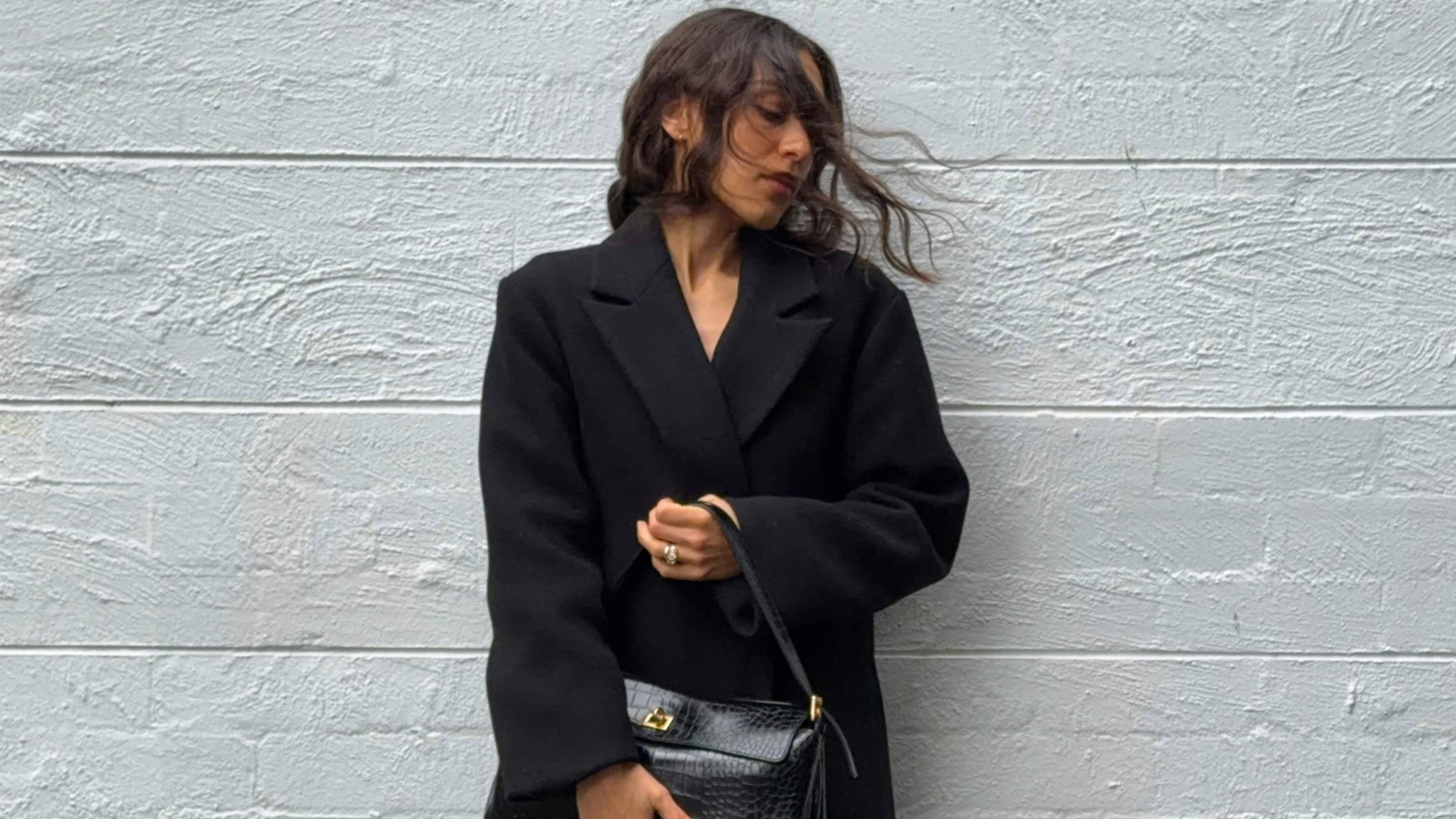 Camelia Farhoodi wearing a wool coat.