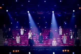 Ensemble singers socially distance during filming for Musicals: The Greatest Show.