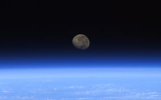 Moonset From ISS space wallpaper