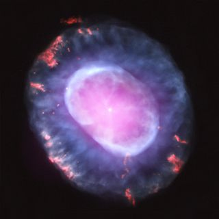 This image is of planetary nebula NGC 7662 as seen with the Chandra X-Ray Observatory. A planetary nebula is a phase of stellar evolution that the sun should experience several billion years from now, when it expands to become a red giant and then sheds most of its outer layers, leaving behind a hot core that contracts to form a dense white dwarf star. This image was released Oct. 10, 2012.