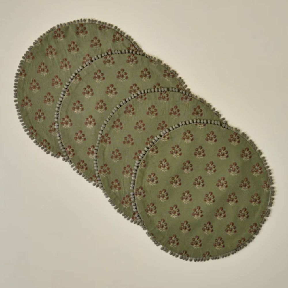 Four olive green round block printed place mats