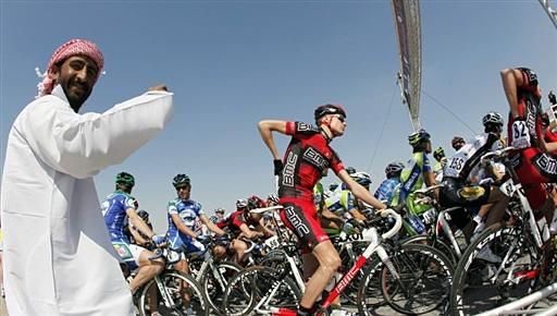 The Qatari tifosi get a good shot of the peloton