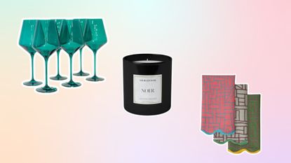 Wine glasses, candle, and napkins on pastel background