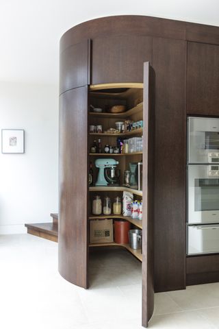 Walk in pantry with shelving