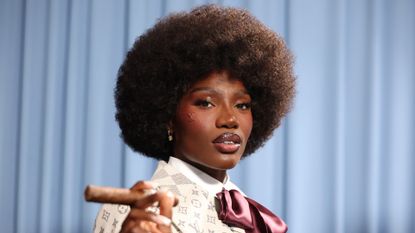 See the Details on Doechii's LV Face Stamp at the Met Gala | Who What Wear