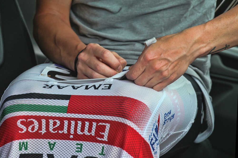 Even the pros pin on their own numbers