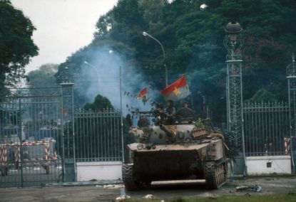 Saigon's fall. Taken of the presidential palace. North - Vietnamese armoured car crossing the railings