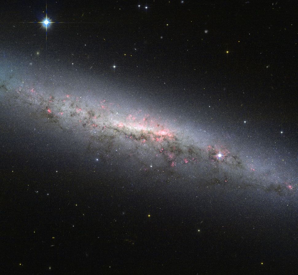 Stunning Hubble Telescope Photo Captures Star-Forming Galaxy | Space