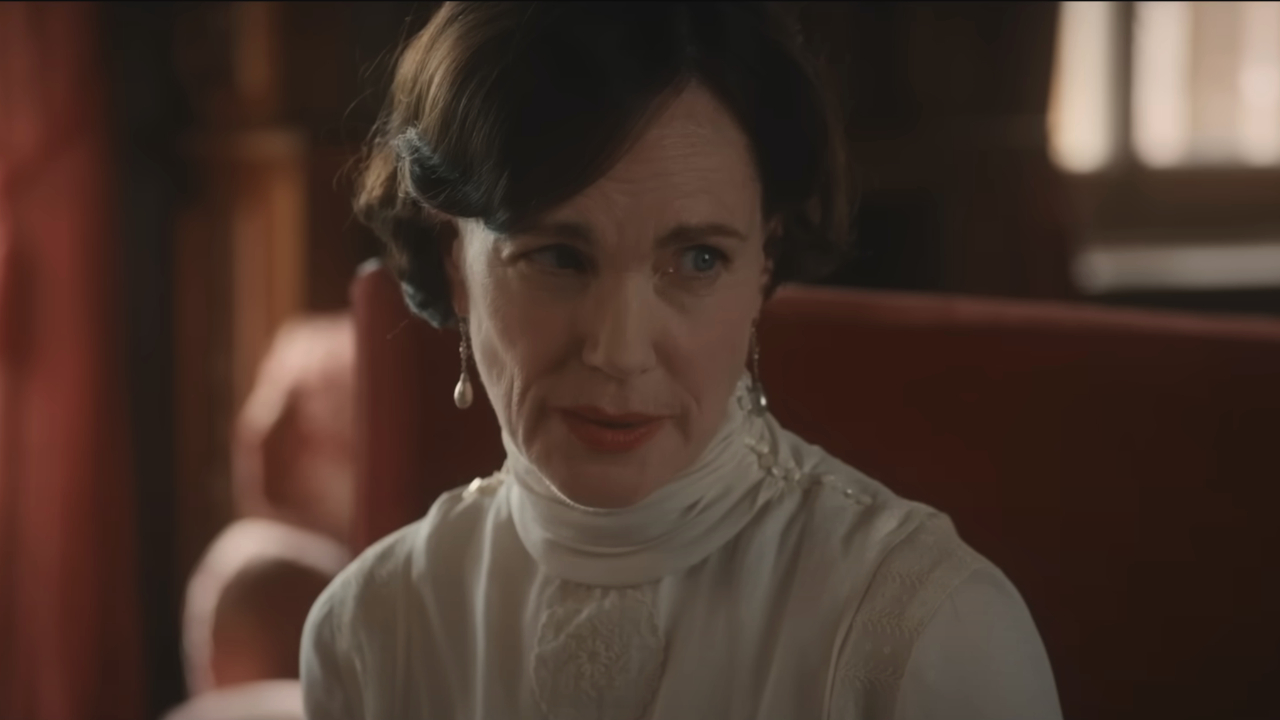 Elizabeth McGovern wears a look of skepticism in conversation in Downton Abbey: The Grand Finale.