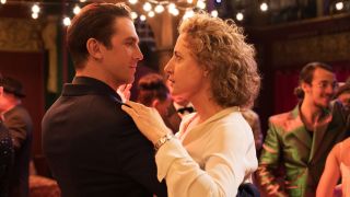 Dan Stevens and Maren Eggert dancing together in a club in I'm Your Man.