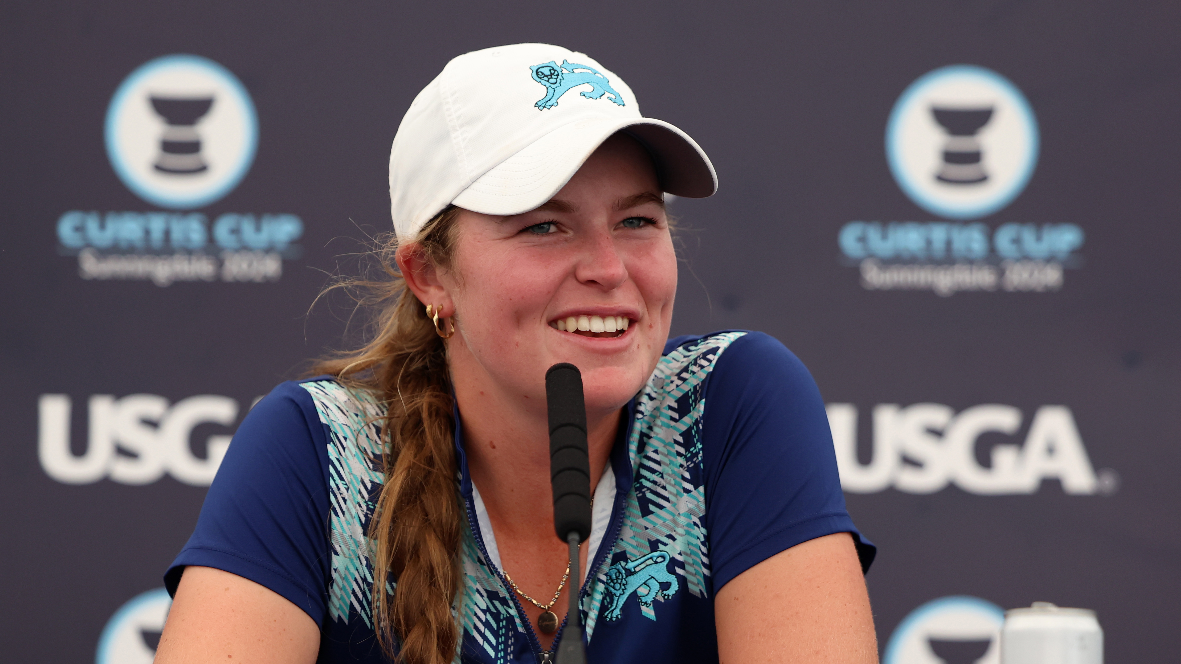 Mimi Rhodes talks during a Curtis Cup press conference