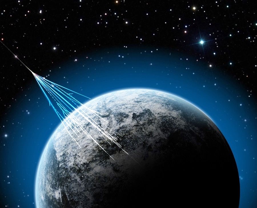 illustration of cosmic rays hitting Earth.