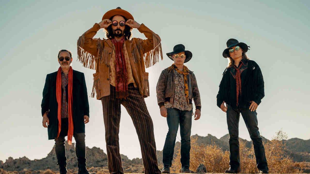 Mike Campbell & The Dirty Knobs posing for a photograph