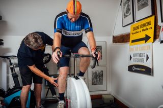 Image shows a rider having a bike fit assessment with an expert.