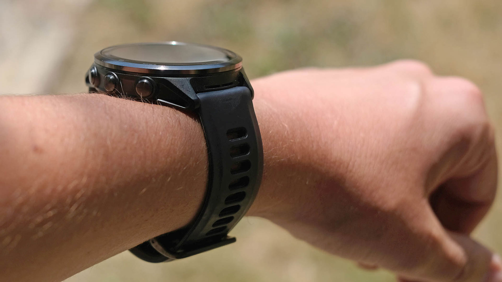 A close-up picture of our reviewer wearing the Garmin Forerunner 570
