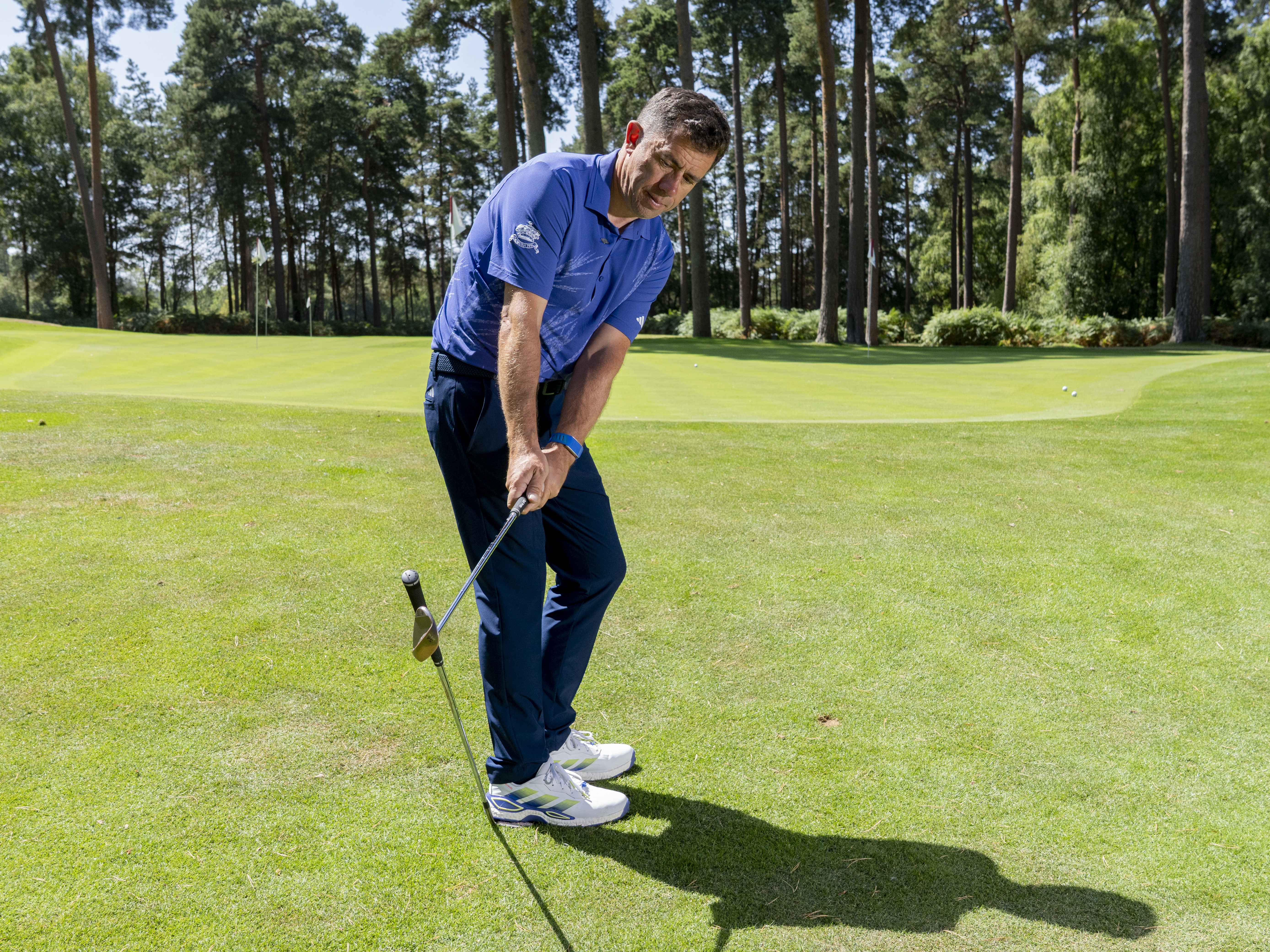 Dan Grieve demonstrating his plane drill using a wedge under his trail foot