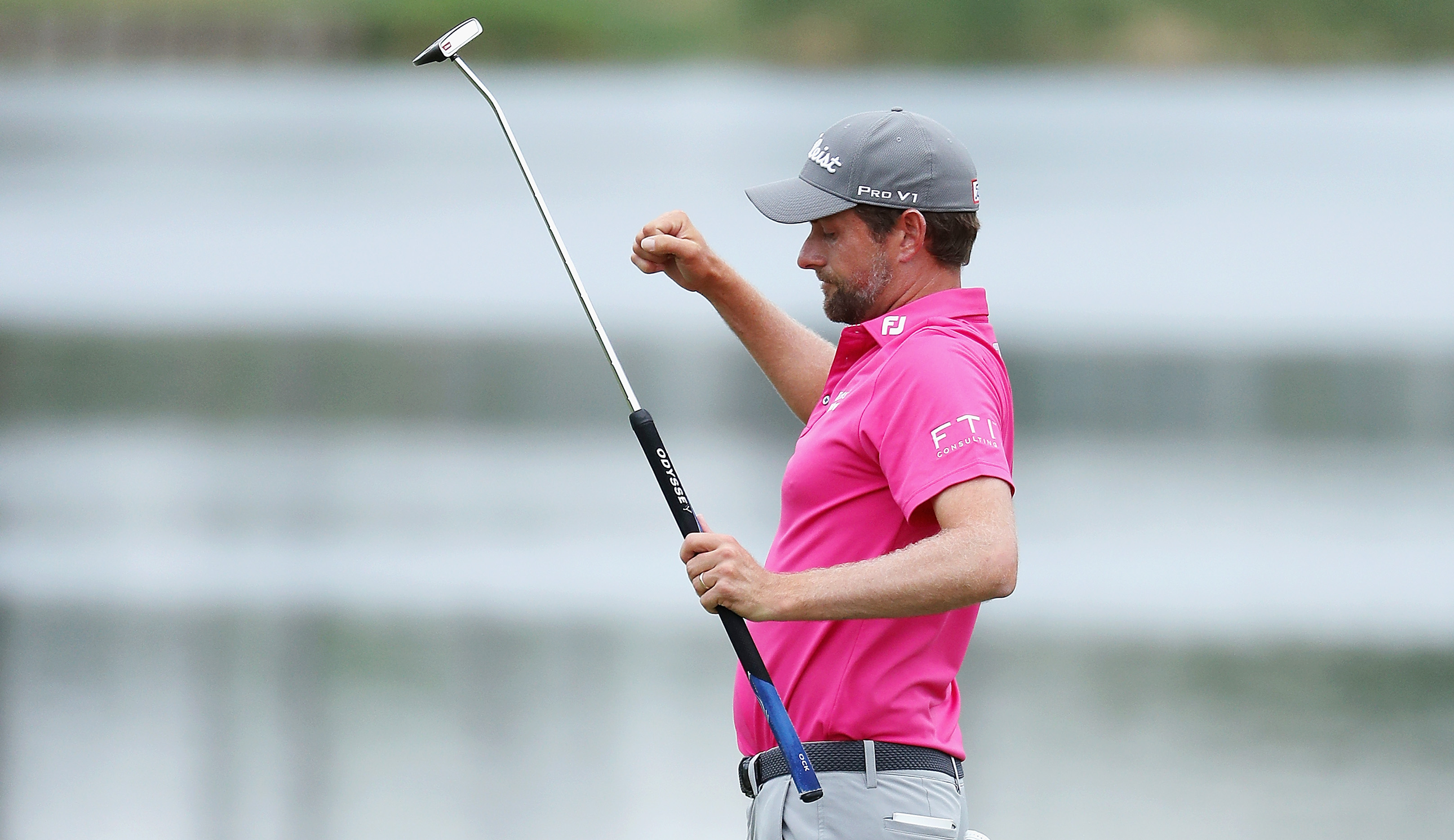 Webb Simpson celebrates a putt