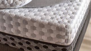 A close-up of a corner of the Layla Memory Foam Mattress with the soft side on display