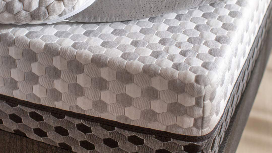 A close-up of a corner of the Layla Memory Foam Mattress with the soft side on display